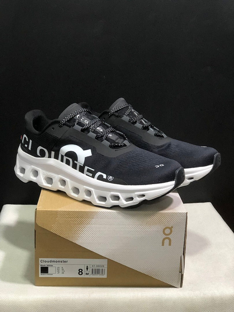 On Cloudmonster Black and White Running Sneakers