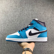 Air Jordan 1 Mid Sneakers in Blue, White and Black