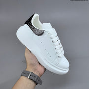 Alexander McQueen Oversized Low-Top Sneakers with Crystal Heel