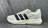 Adidas Lightstrike Low-Top Sneakers in White and Black