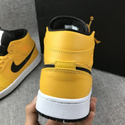 Air Jordan 1 Mid University Gold Black White Sneakers