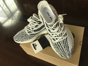 Yeezy 350 V2 Glow-in-the-Dark Sneakers, Black and White