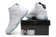 Jordan Air Jordan 11 Retro High-Top Sneakers in White and Blue