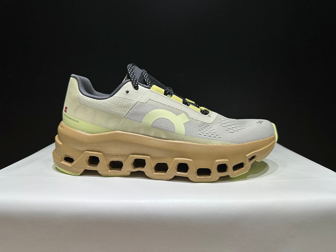 On Cloudmonster Sneakers in Sand Dune
