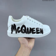Alexander McQueen Oversized Sole Sneakers with Graphic Logo