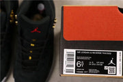 Jordan Air Jordan 12 Reverse Taxi Sneakers Black 153265-017
