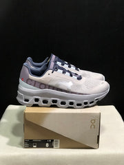 On Cloudmonster Sneakers in Gray and Purple