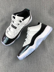Jordan 11 Low Sneakers in White and Black