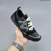 New Balance MT10O6NW Low-Profile Sneakers in Black