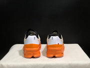 On Cloudmonster Running Shoes in Yellow Tan and Orange