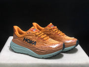 HOKA Stinson 7 Trail Running Shoes in Orange
