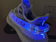Yeezy 350 V2 Glow-in-the-Dark Sneakers, Black and White
