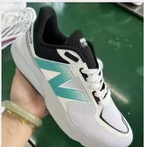 New Balance MFLSHBW Running Shoe in White and Teal