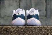 Air Jordan 11 Low Navy Snakeskin Sneakers