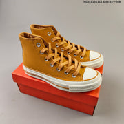 Converse Chuck 70 High Top Sneakers in Mustard