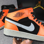 Air Jordan 1 Mid Sneakers Black Orange 554724-062