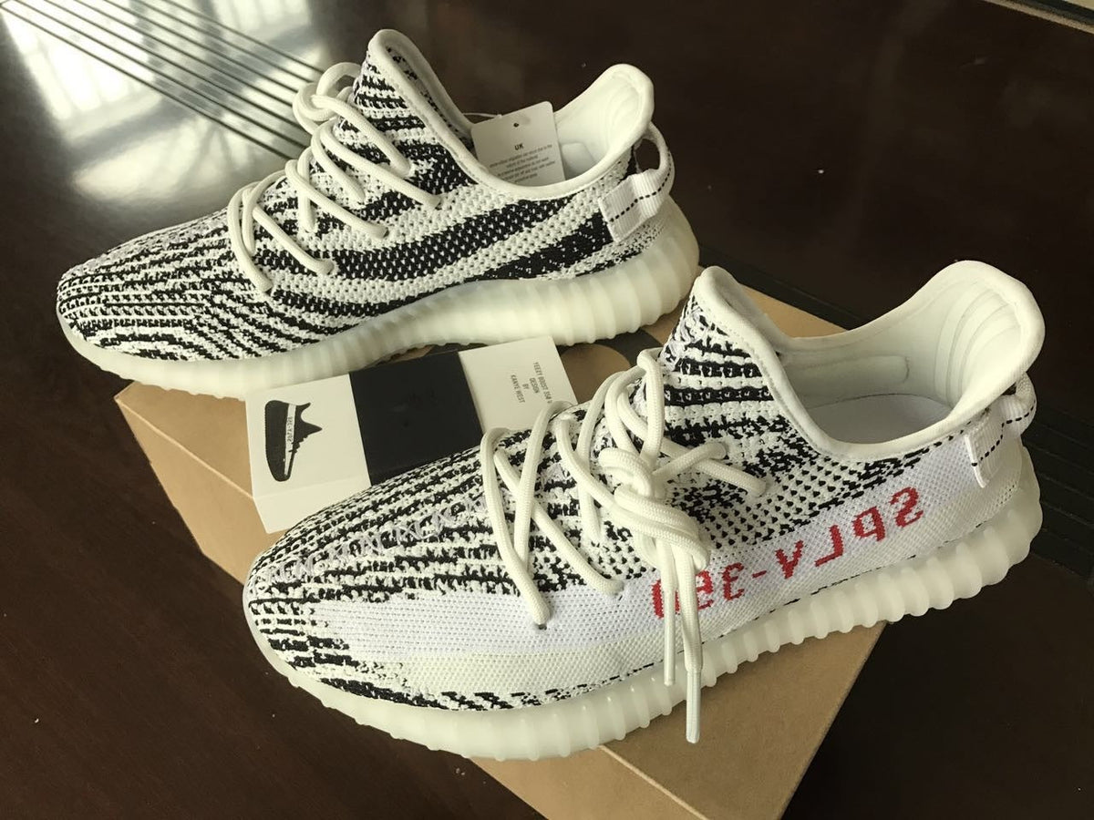Yeezy 350 V2 Glow-in-the-Dark Sneakers, Black and White