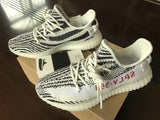 Yeezy 350 V2 Glow-in-the-Dark Sneakers, Black and White