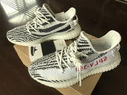 Yeezy 350 V2 Glow-in-the-Dark Sneakers, Black and White