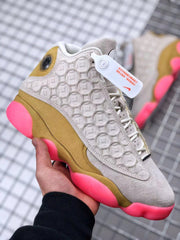 Air Jordan 13 CNY Sneakers in White, Gold and Pink
