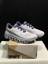 On Cloudmonster Sneakers in Gray and Purple