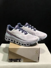 On Cloudmonster Sneakers in Gray and Purple