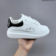 Alexander McQueen Oversized Low-Top Sneakers, White and Black