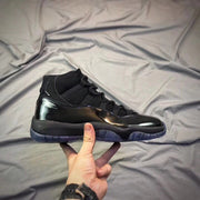 Air Jordan 11 Cap and Gown Black High-Top Sneakers