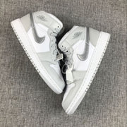 Jordan Air Jordan 1 Mid GS White and Silver Sneakers