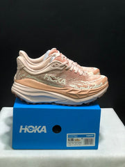 HOKA Stinson 7 Trail Running Shoes in Blush and Cream