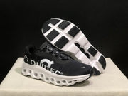 On Cloudmonster Black and White Running Sneakers