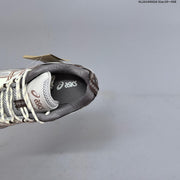 ASICS GEL-NANDI NR Sneakers in Cream, Gray and Brown