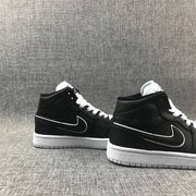 Air Jordan 1 Mid Black and White Sneakers 852542-016