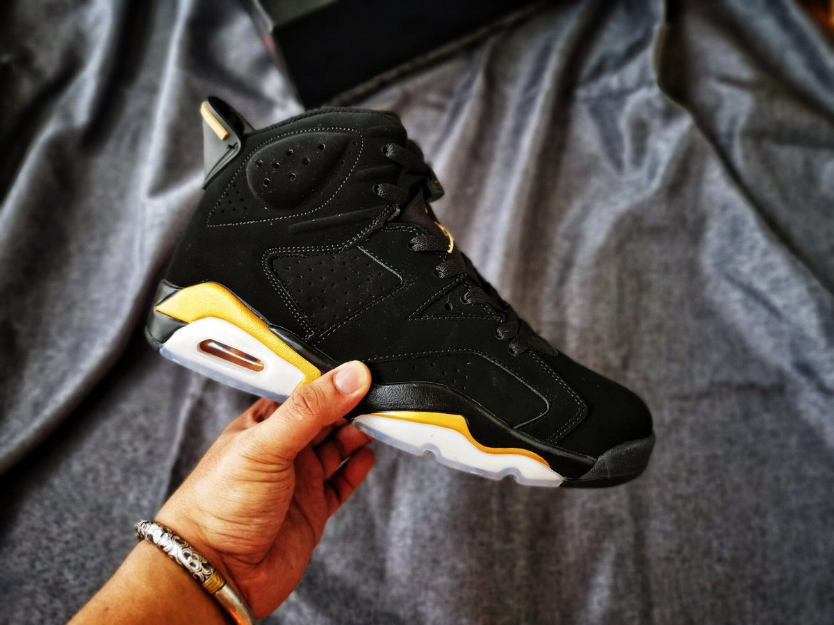 Air Jordan 6 Black and Gold High-Top Sneakers
