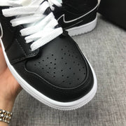 Air Jordan 1 Mid Black and White Sneakers 852542-016