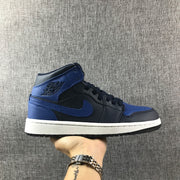 Air Jordan 1 Mid Black and Royal Blue High-Top Sneakers