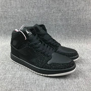 Jordan Air Jordan 1 Mid Black and White Sneakers 554724-001