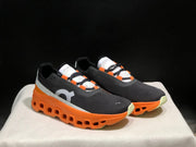 On Cloudmonster Running Shoes Black Orange