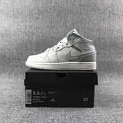 Air Jordan 1 Mid Sneakers in White and Grey