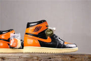 Air Jordan 1 Retro High OG Black and Orange Sneakers