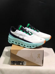 On Cloudmonster Running Shoes in White and Aqua