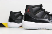 Air Jordan 11 Retro 72-10 Black and White High-Top Sneakers