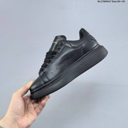 Alexander McQueen Oversized Low-Top Sneakers with Logo