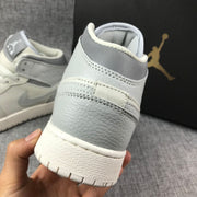 Air Jordan 1 Mid Sneakers in White and Grey