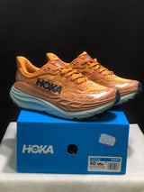 HOKA Stinson 7 Trail Running Shoes in Orange