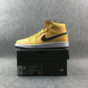Air Jordan 1 Mid Yellow Ochre Black Sneakers 554724-700