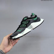 New Balance 9060 Sneakers in Charcoal and Green