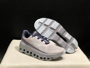 On Cloudmonster Sneakers in Gray and Purple