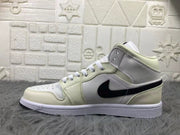 Jordan Air 1 Mid Sneakers Cream White and Black