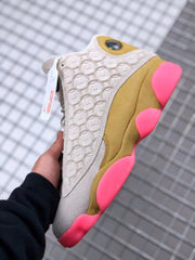 Air Jordan 13 CNY Sneakers in White, Gold and Pink